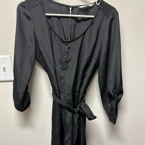 Black romper with tie. Never worn